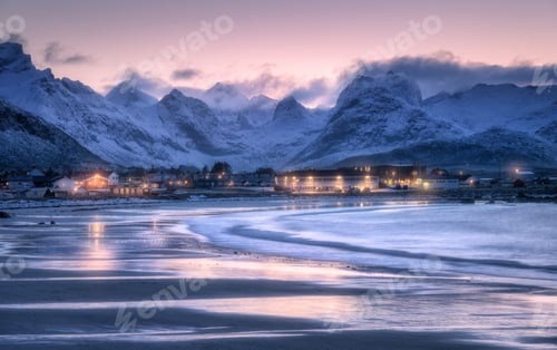Preview: View of sandy beach, sea, waves, snowy mountains, lights at night