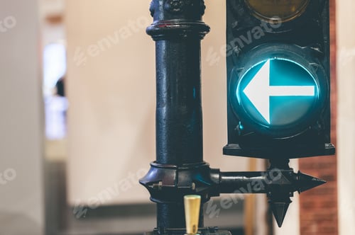 Preview: Arrow sign on a traffic light