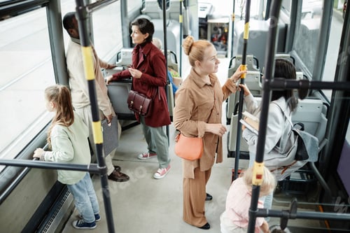 Preview: People Commuting on Bus High Angle