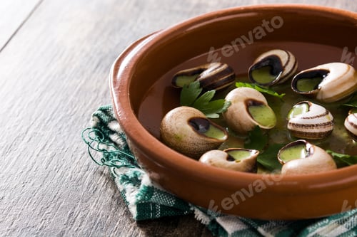 Preview: Escargots de Bourgogne. Snails with herbs and garlic butter.