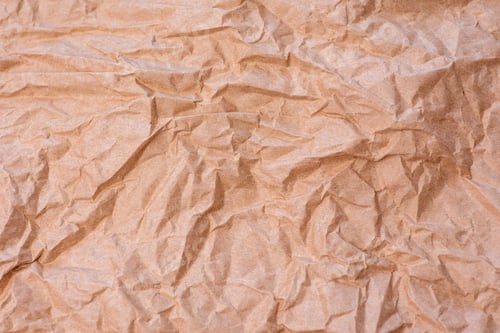 Visualização: Foto de perto de papel pardo esfarelado