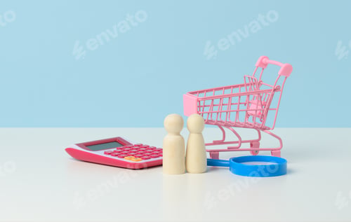 Preview: Miniature metal shopping cart, pink calculator and wooden family.