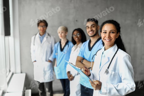 Preview: Multiracial team of doctors having morning breefing