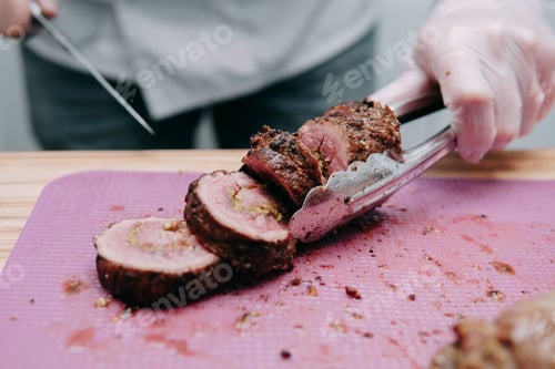 Preview: Cooking meat rolls in the cooking class. Beef roll with spices. The process of cutting a roll