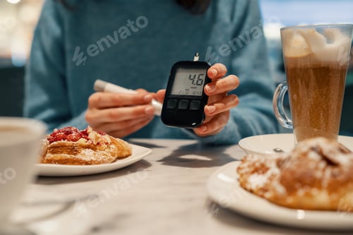 Preview: Diabetic woman measuring normal sugar level. Preparing yourself for meals