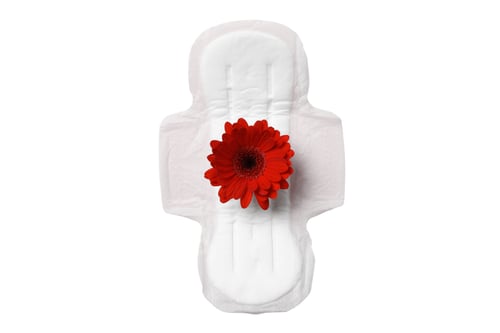 Preview: Colorful feminine hygiene products with a flower design, isolated on white