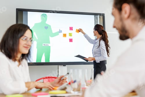 Preview: Businesswoman leading a presentation