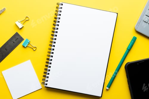 Preview: Flat lay of notebook with copy space and writing materials on yellow background