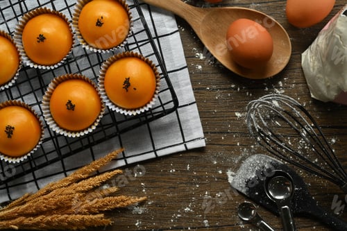 Preview: Chinese pastry with stuffed salted yolk on wooden kitchen table