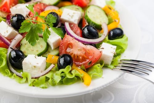 Preview: Greek salad on the white plate