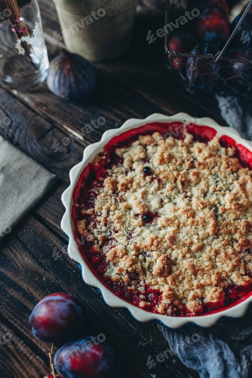 Preview: Homemade cakes, sweet plum cake on a dark background, rustic table setting