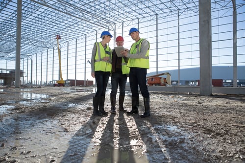 Preview: Architect and builders meeting on construction site