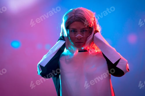 Preview: Beautiful woman looking through the futuristic glasses, dark background, future and virtual reality