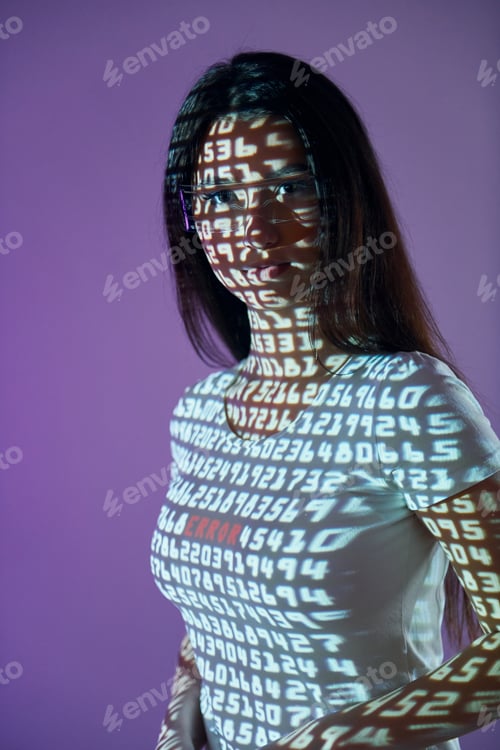 Preview: Different digits. Beautiful young woman is in projector neon lights in the studio