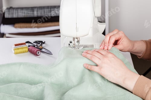Preview: Sewing machine, stitching fabrics, needle in a round plan