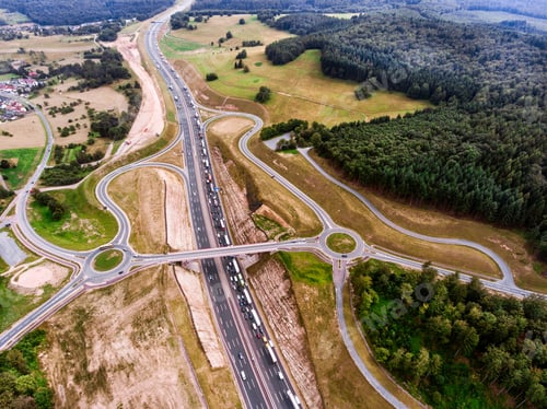 Preview: Aerial view of highway junction, green forest, Netherlands
