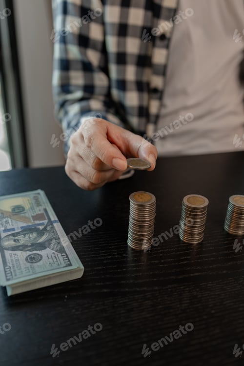 Preview: he is saving money for his future plans, putting some if his income in a piggy bank