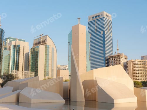 Preview: A city skyline in Abu Dhabi with a modern-looking park