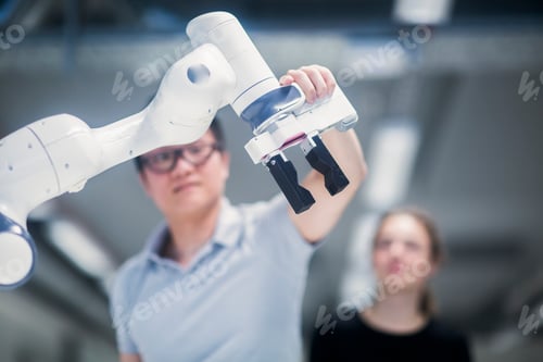 Preview: Sudents studying robotic at an university institute