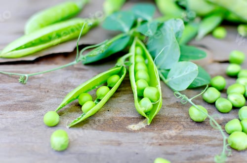 Preview: Pods of young green peas and pea