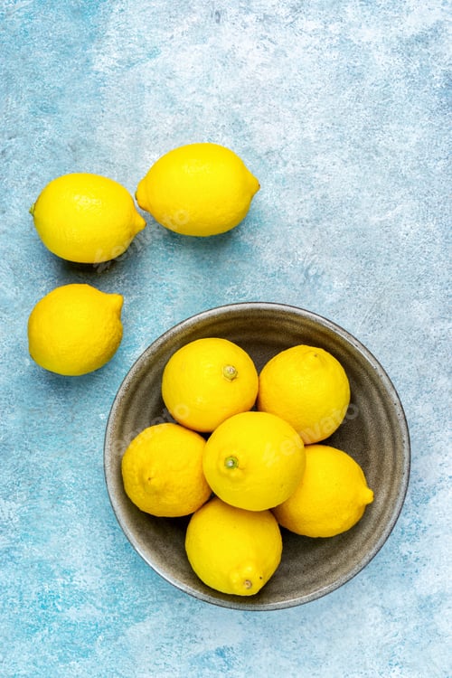 Preview: whole yellow lemons isolated on bright background. Lemons citrus fruit, healthy, summer. Copy space