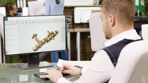 Preview: Bearded construction engineer working on his computer