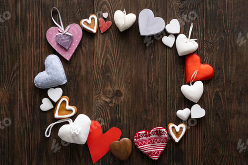 Preview: Love concept for mother's day or valentine's day. Many hearts on wooden background.