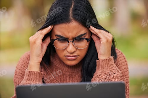 Preview: Study, university and laptop student stress at campus with anxiety for a test. Scholarship woman wi