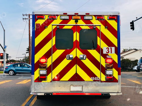 Preview: Ambulance on the road heading to rescue someone in danger.
