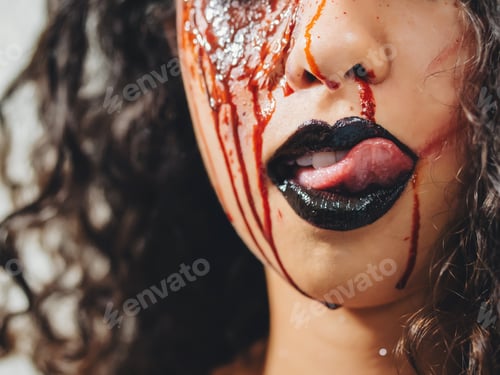 Preview: Living dead girls tongue. bloody face. Halloween makeup