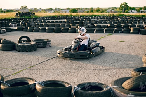 Preview: Handsome man in a karting with a car