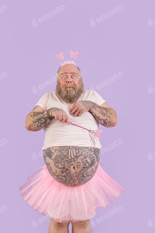 Preview: Shocked bearded man with overweight in fairy costume on purple background