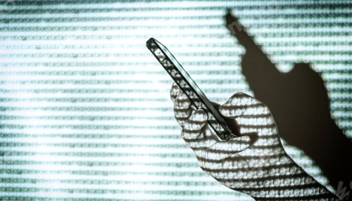 Preview: Data visualization, binary code illuminating hand holding smartphone