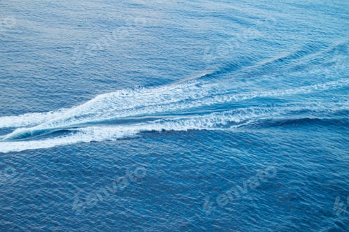 Preview: Boat track on the sea, white foam, blue waves, beautiful background