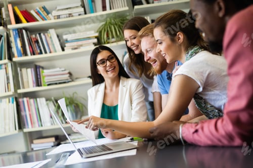 Preview: Successful group of business people at work in office