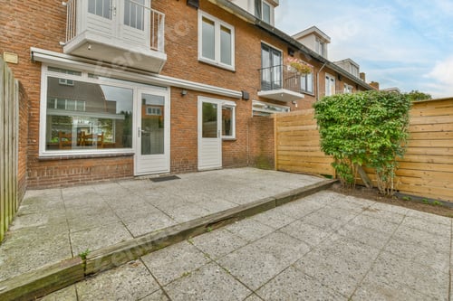 Preview: a two-story house with red brick