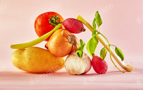 Preview: A gourmet food composition with colorful vegetables on a pink background