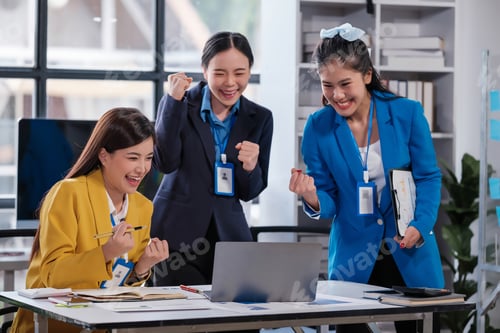 Preview: Happy overjoyed business team celebrate corporate victory