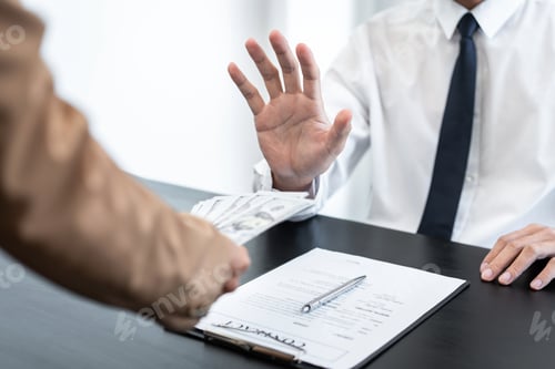 Preview: Businessman is refuses to accept banknote money and terms of contract from bribe employer