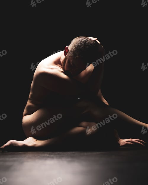 Preview: Artistic nude male model in a unique pose displaying muscle definition and flexibility of yoga.