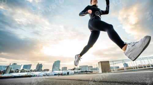 Preview: Runner woman feet running on urban road