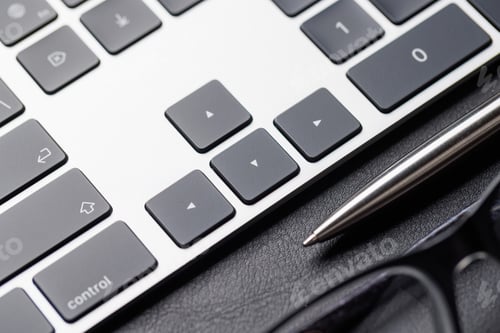 Preview: Office supplies on dark leather desk