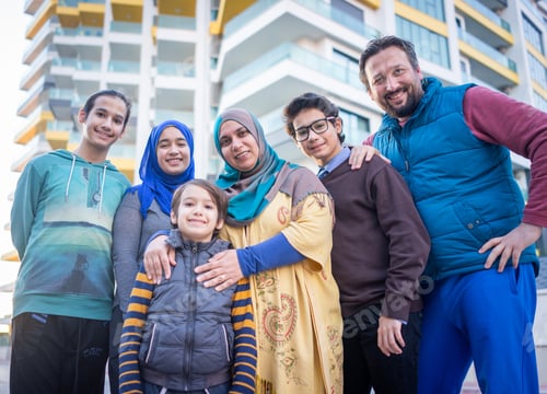 Preview: Real Muslim family on city street portrait