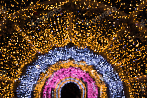 Preview: Blurred garland as arc or semicircle. City night light blur bokeh, defocused background.