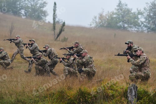 Preview: A disciplined and specialized military unit, donned in camouflage, strategically patrolling and