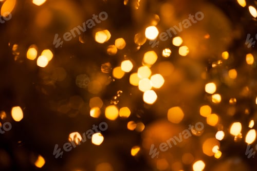Preview: Christmas blurred golden lights out of focus on the tree, festive christmas glowing bokeh background