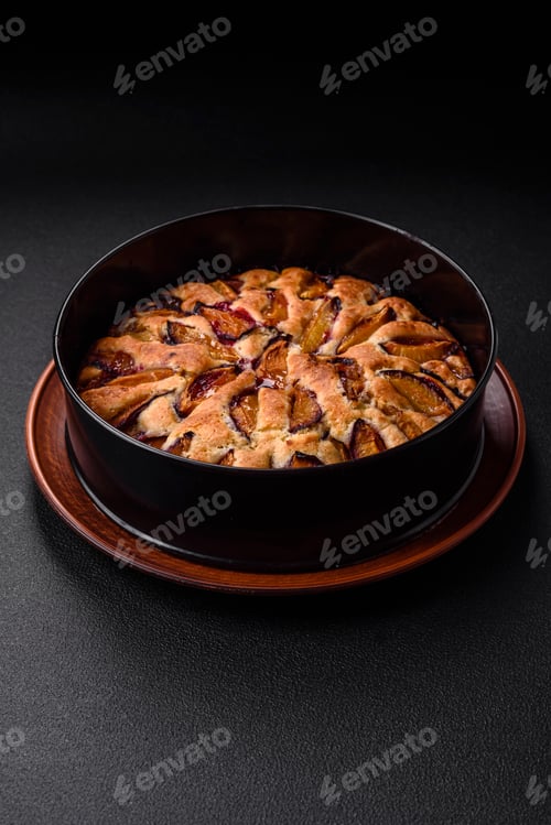 Preview: Delicious sweet aromatic homemade pie with ripe plums