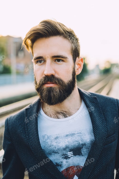 Preview: Young bearded man outdoor