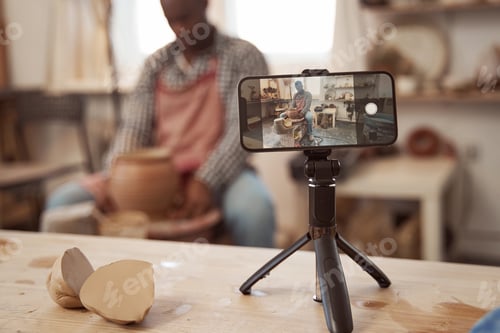 Preview: Craftsman making earthenware vessel in his workshop