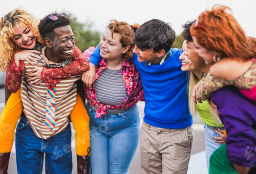 Preview: Multiracial young friends having fun together outdoor - Diverse people and friendship concept